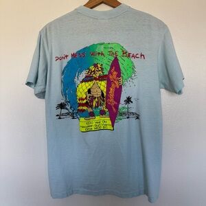Vintage 90s Surfing T-Shirt Mens M/L Blue Lightning Bolt Single Stitch USA Tee